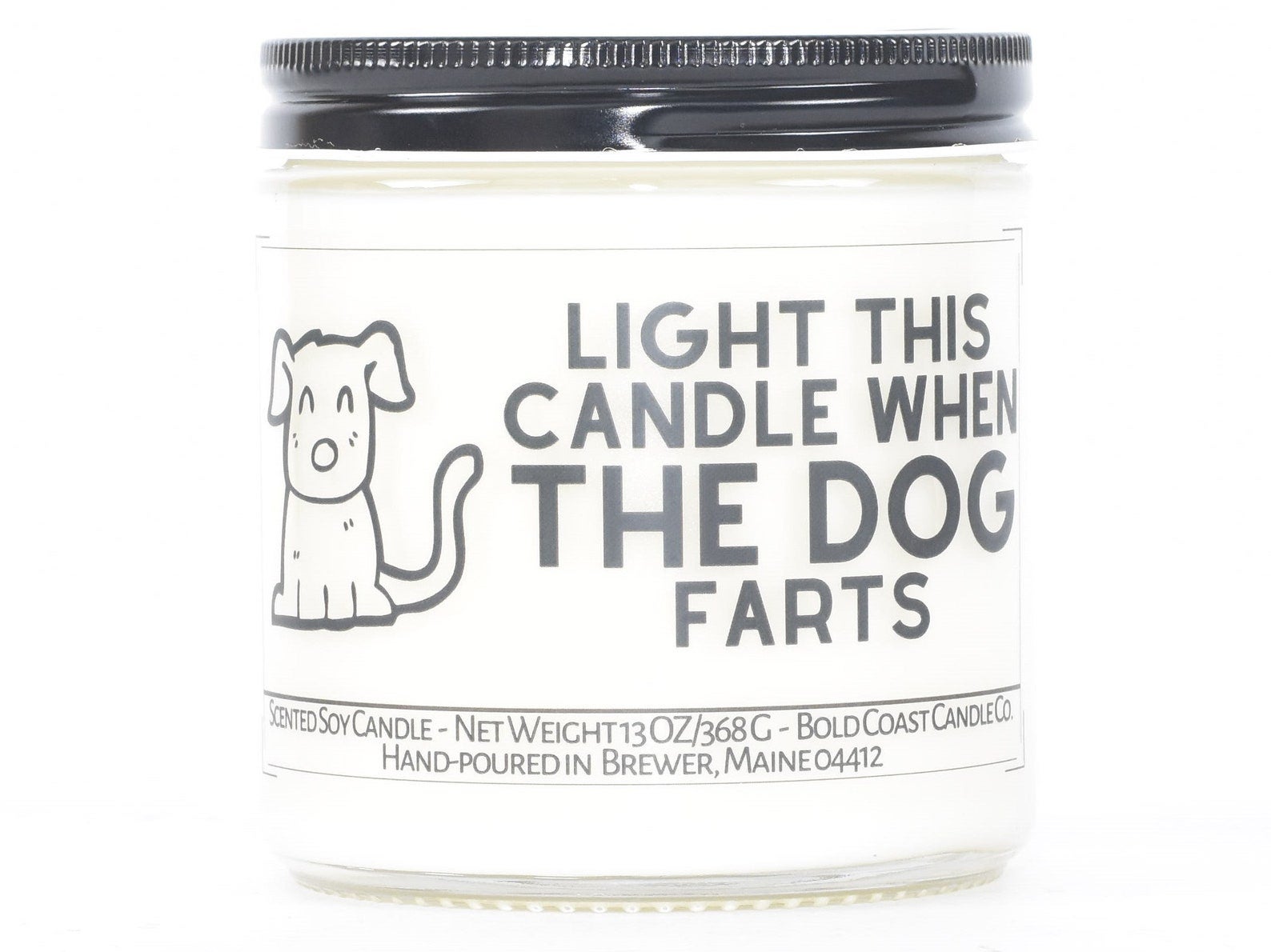 Black and white candle that reads