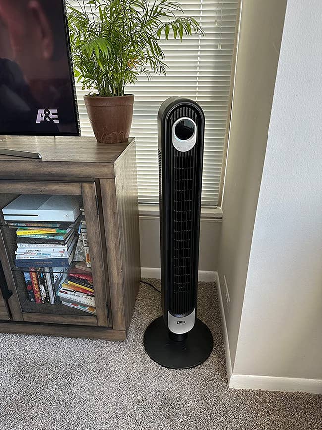 the black oscillating tower fan