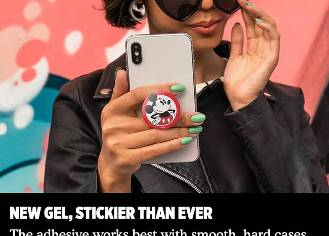 a model with a classic red and black mickey popsocket