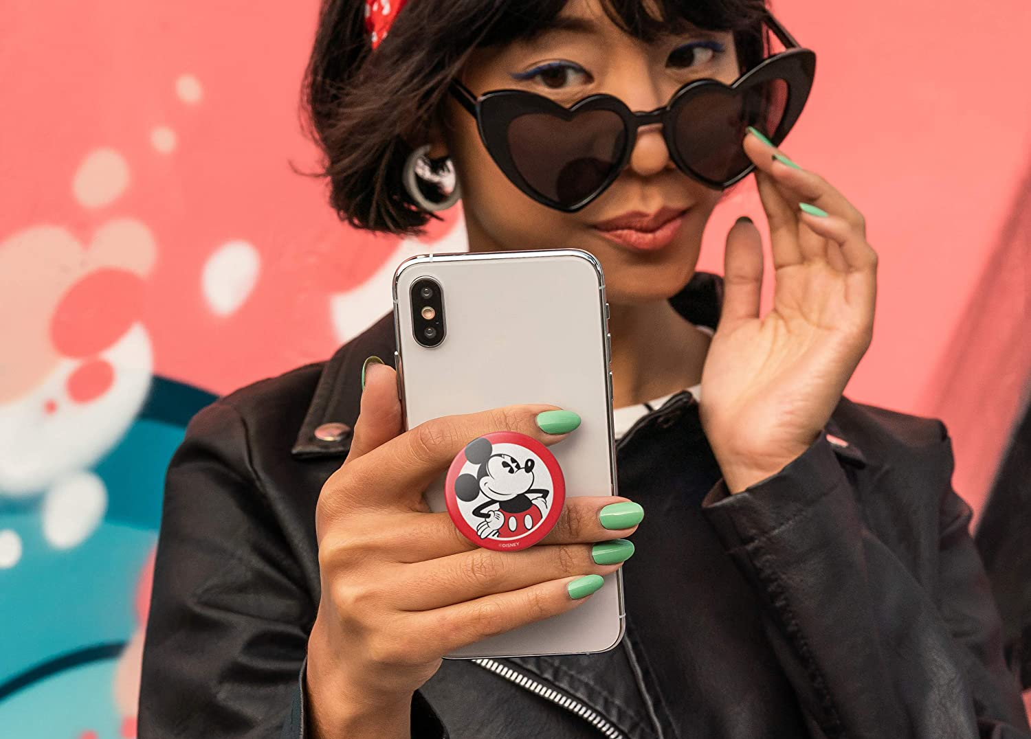 a model with a classic red and black mickey popsocket