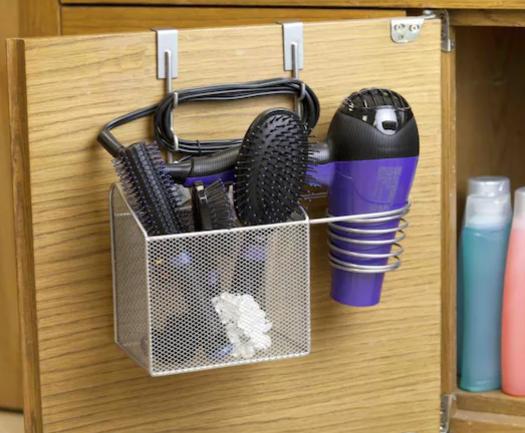 over-cabinet organizer with brushes and a hairdryer