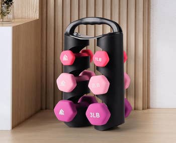 Set of hex dumbbells successful  a rack, displaying weights of 1 lb, 2 lbs, and 3 lbs each. Ideal for airy  spot    training