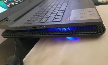 Laptop on top of cooling pad