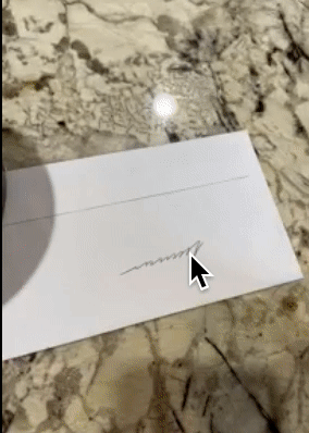gif of reviewer using stamp to cover a signature