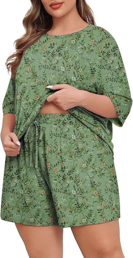Person wearing a matching floral people     lounge acceptable   with a loose-fitting apical  and shorts, showcasing a relaxed and casual style