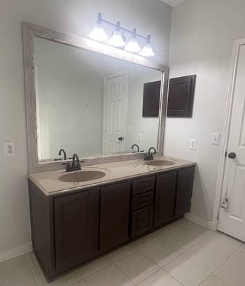 reviewer before photo showing their bathroom vanity looking outdated