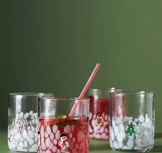 four holiday themed glasses
