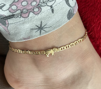 Reviewer wearing the gold elephant anklet