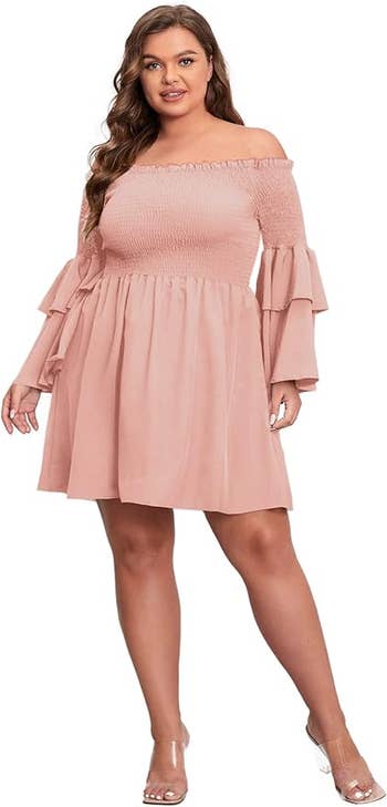 model in an off-the-shoulder dress with ruffle sleeves