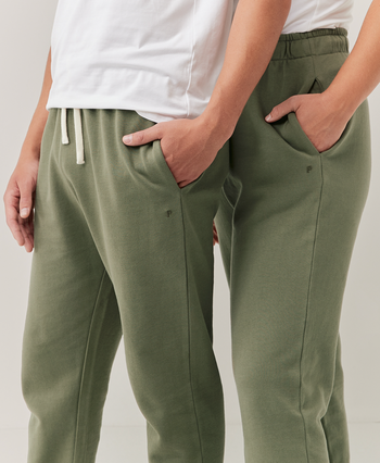 the same two models wearing the sweatpant in caper