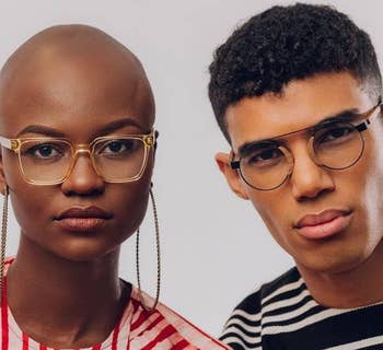 two people wearing glasses 