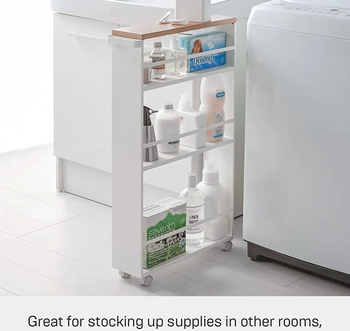 the storage cart between a washer and dyer machine