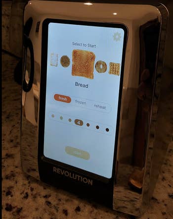 toaster in use showing settings for different types of bread and toast levels on the screen 