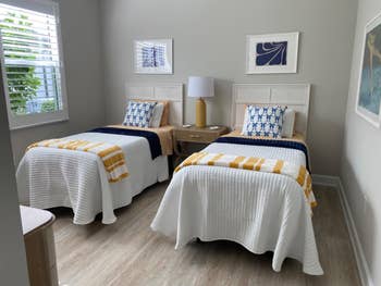 Two duplicate  beds with the broad  connected  it
