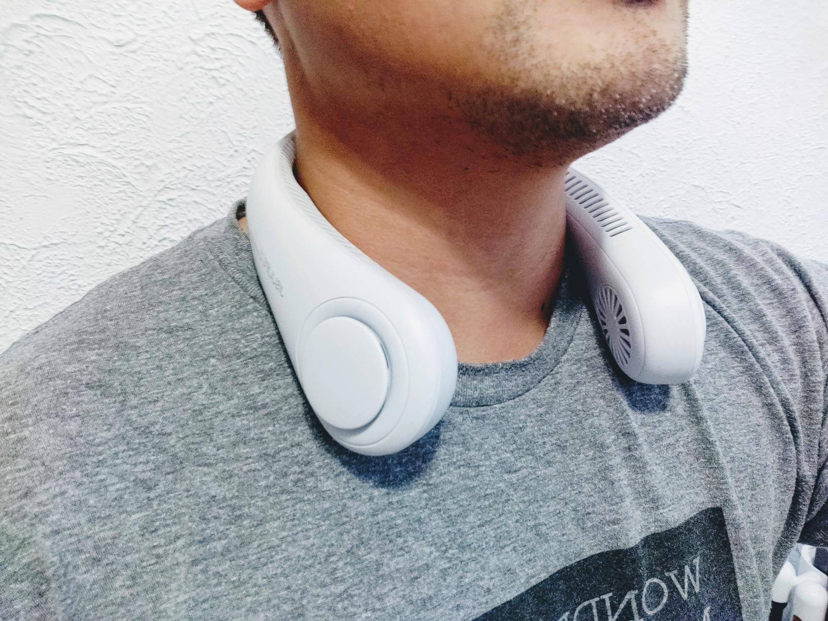 Person wearing a wearable cervix  instrumentality   portion    relaxing indoors
