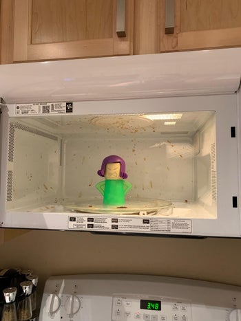 a reviewer photo of their dirty microwave