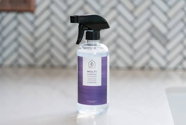 The spray bottle of lavender lemon cleaner