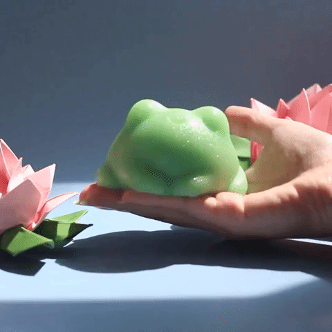 gif of a jiggling green frog-shaped soap