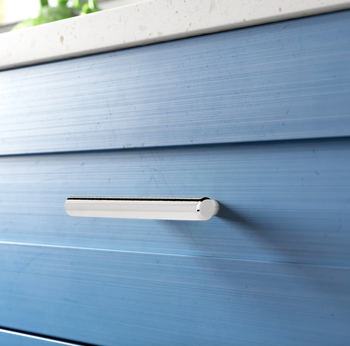 polished nickel color handle bar on blue drawer