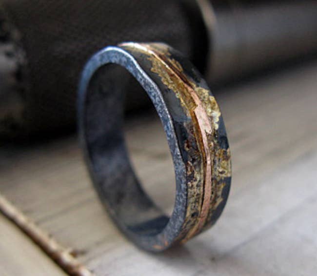 The mixed metal band with gold, rose gold, and silver accents throughout