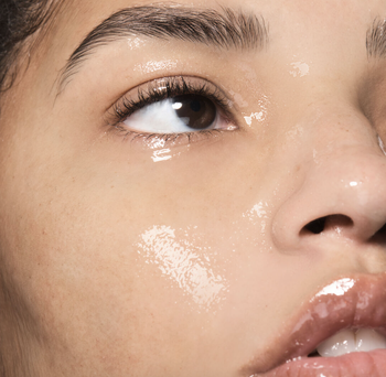 Model wearing primer on face