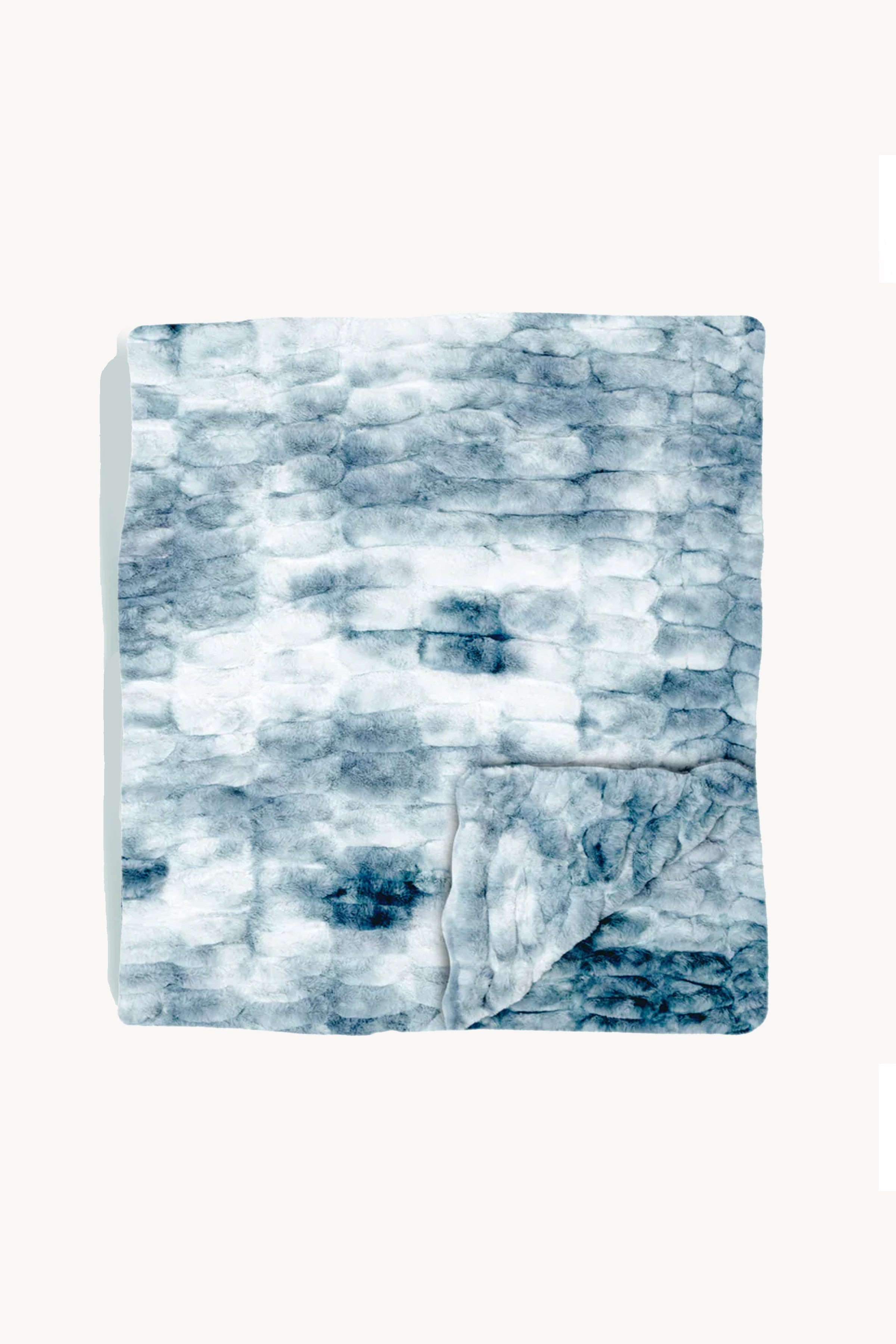 Plush, textured broad  folded neatly, featuring a soft, layered plan  suitable for cozy location  decor