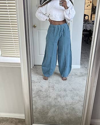 reviewer mirror selfie wearing blue harem pants