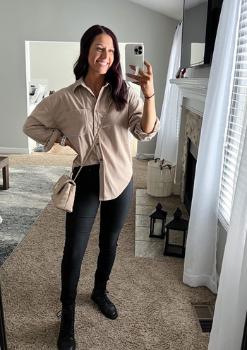 reviewer wearing the shacket in beige