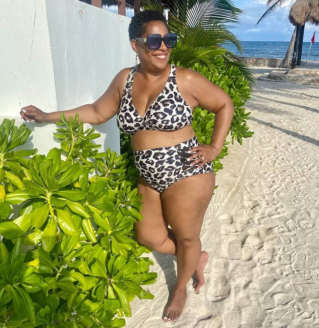 reviewer wearing a leopard-print bathing suit