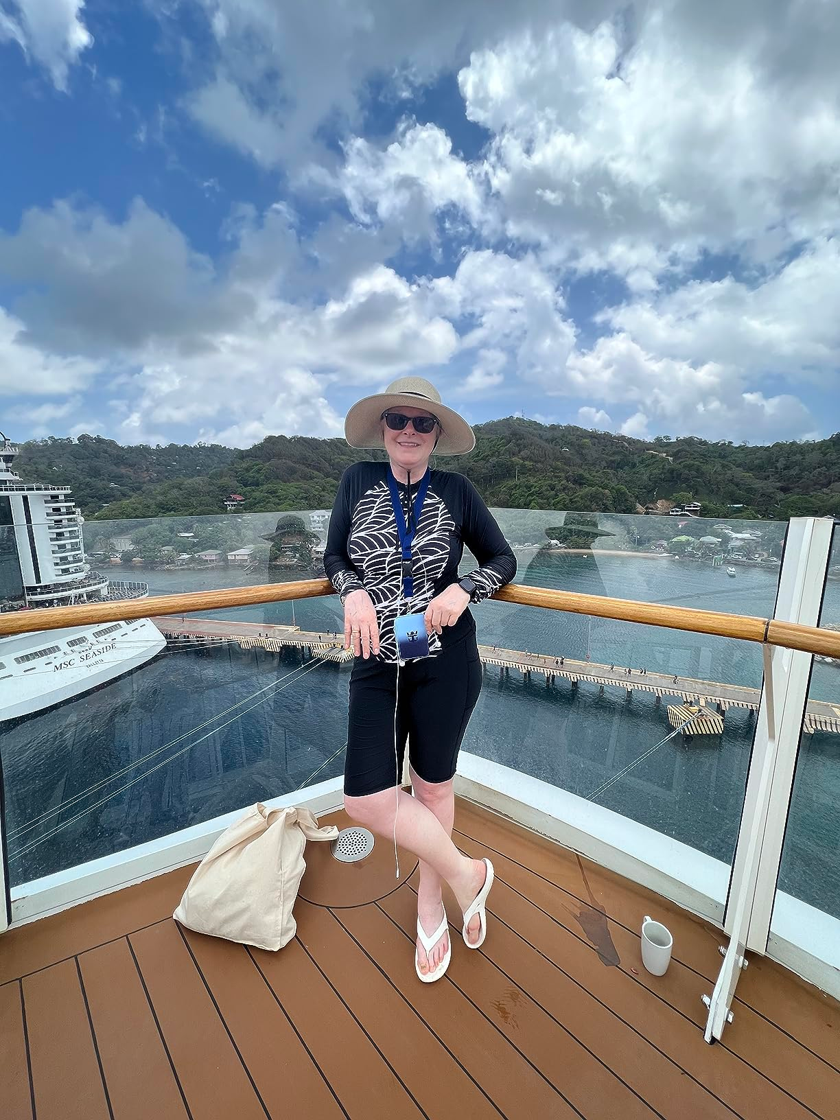 reviewer on ship wearing the black shorts