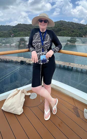 reviewer on ship wearing the black shorts
