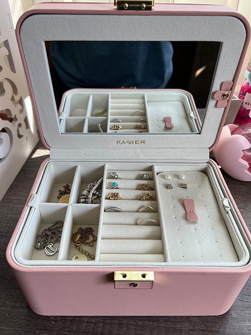 reviewer photo of interior of pink jewelry box