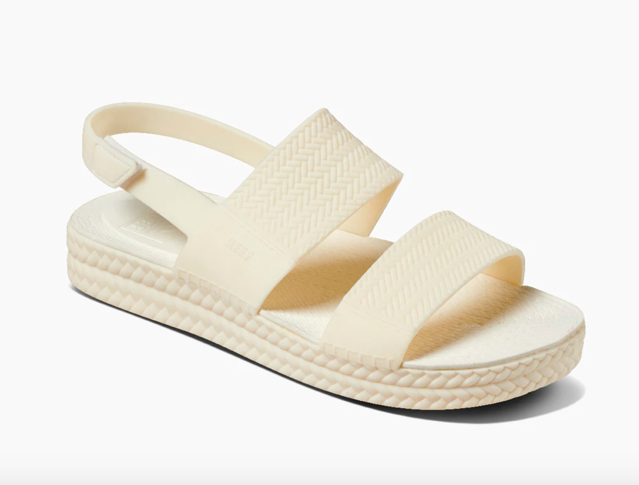 The white platform sandals with two front straps and a velcro heel strap