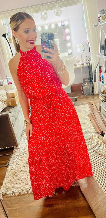 different reviewer wearing the dress in red and white polka dots