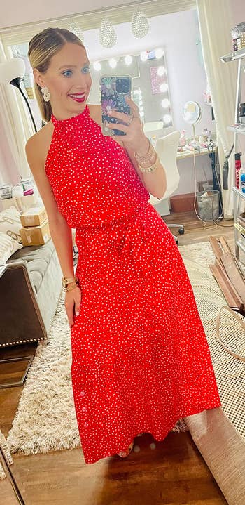 different reviewer wearing the dress in red and white polka dots