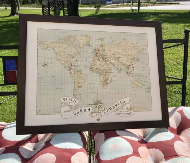 world map push pin with personalization for a couple on the bottom