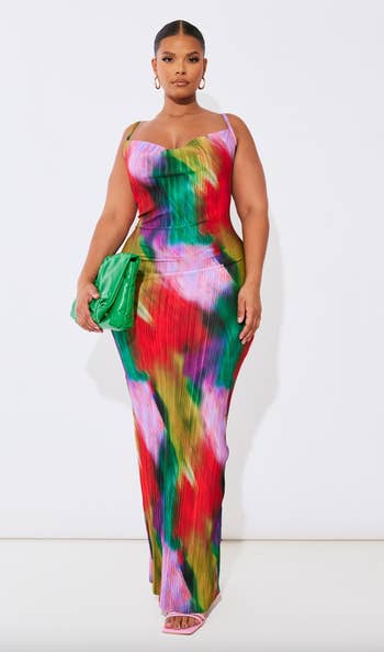 model in maxi pleated dress
