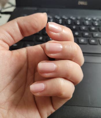 reviewer with manicure looking fresh with bonder coat 