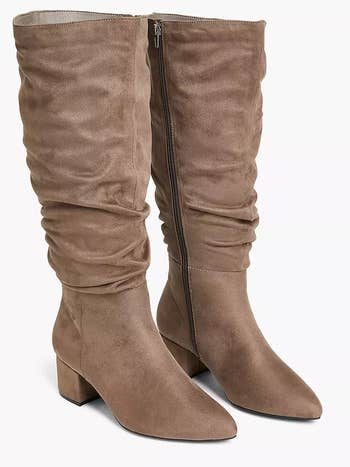 the slouchy tan boots from the front