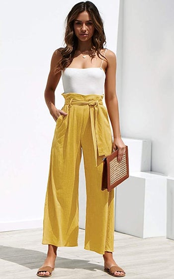 model wearing the yellow pants