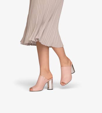 Model wearing pink heels