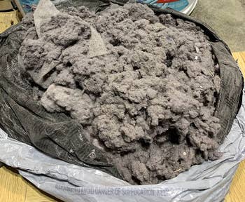 a large pile of lint that a reviewer vacuumed out of their lint trap