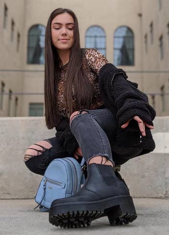 close up   of reviewer's ft  wearing the achromatic  boot