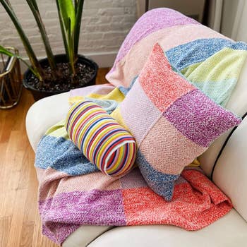 multicolored pastel throw with matching pillow