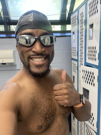 Person successful  aquatics  headdress  and goggles