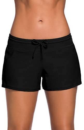 model wearing the black boardshorts with drawstring