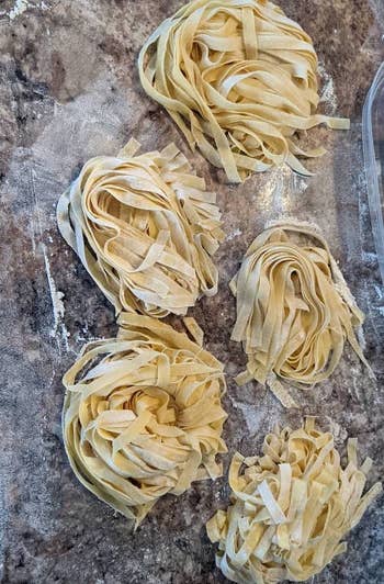 reviewer photo of five small piles of homemade noodles