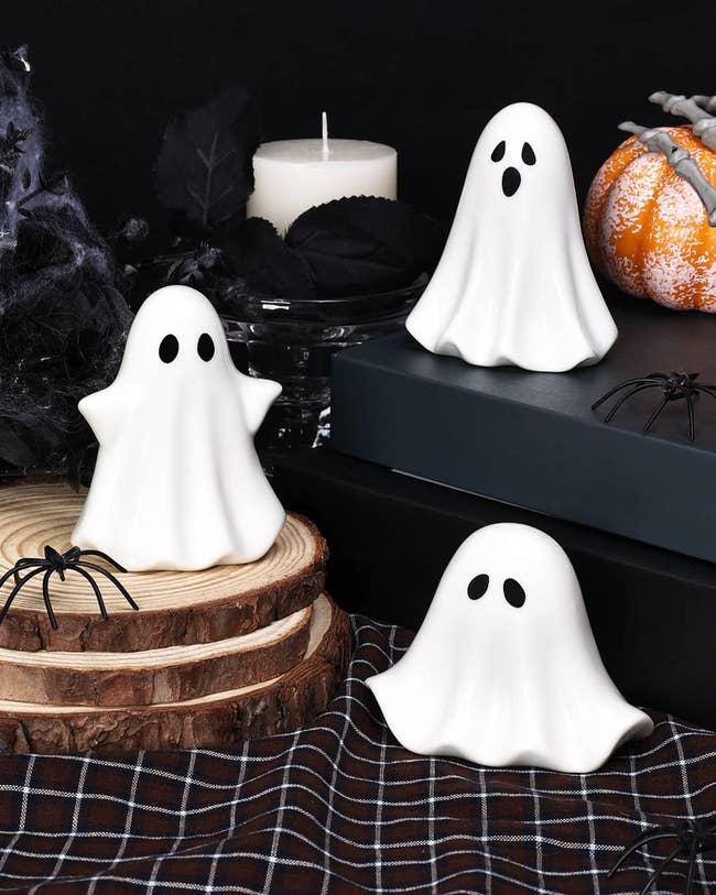 three ceramic ghost decorations