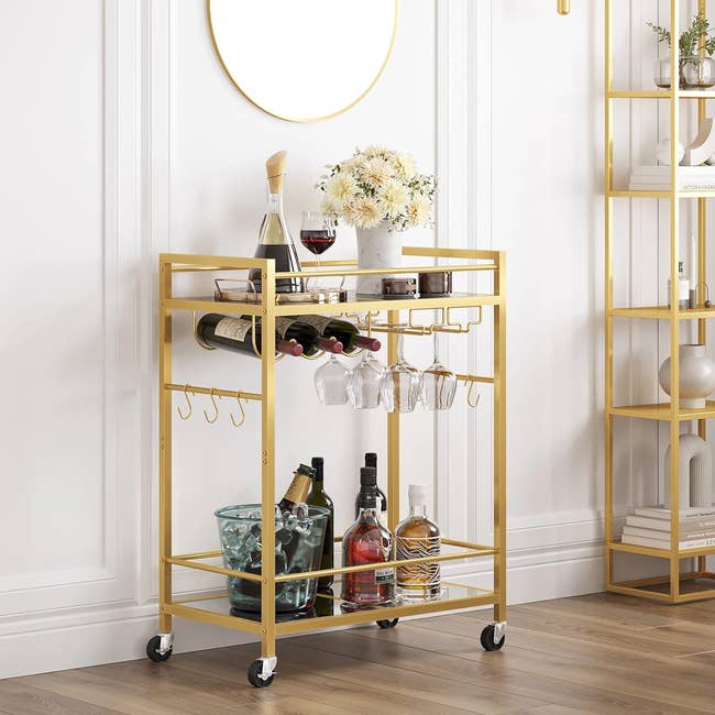 two-tier gold rolling bar cart