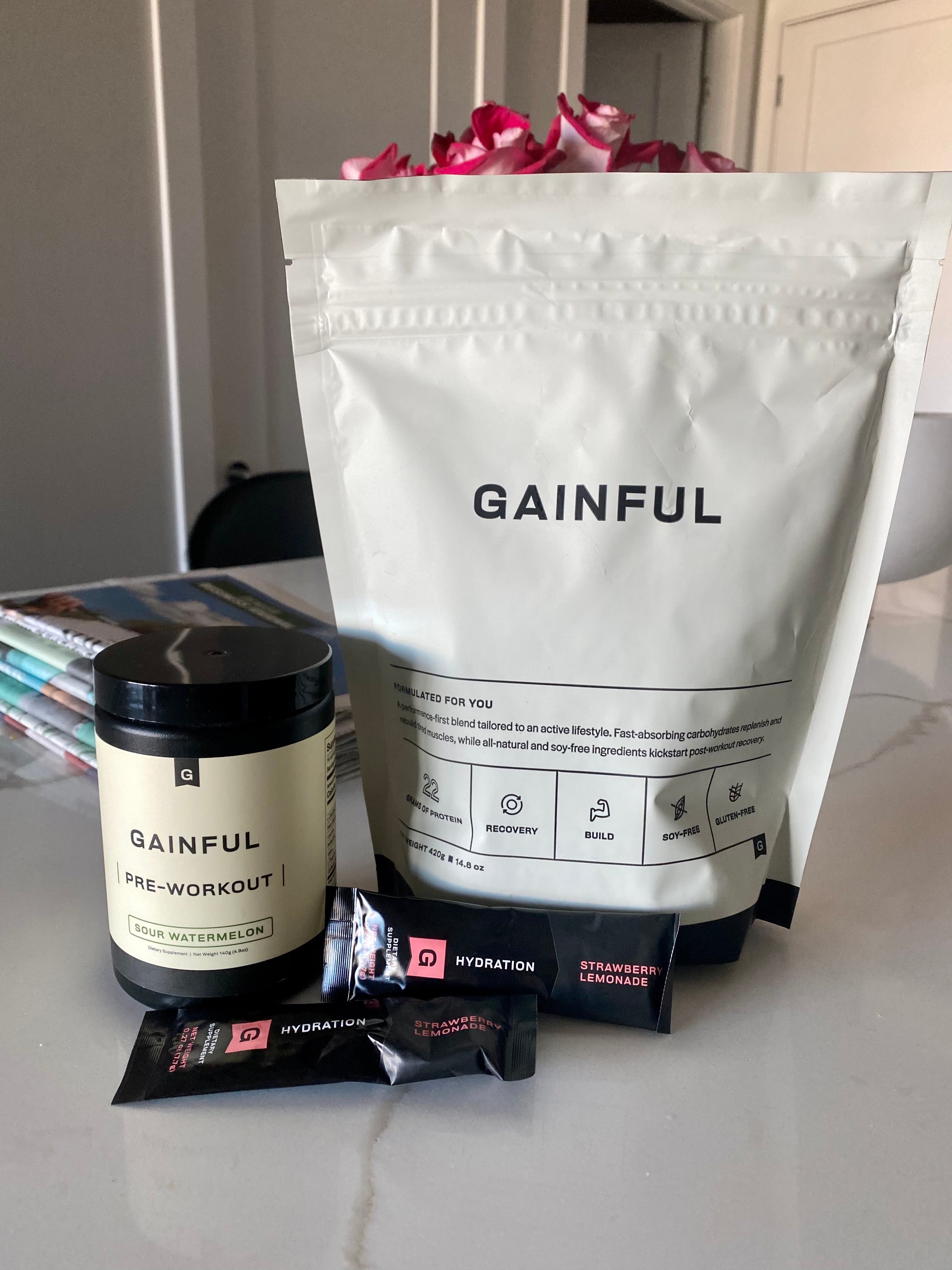 BuzzFeed writer Kayla Suazo's photo of Gainful protein powder and pre workout on counter